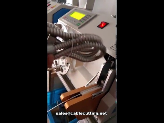 Máquina automática para enrollar y atar conductos flexibles de agua