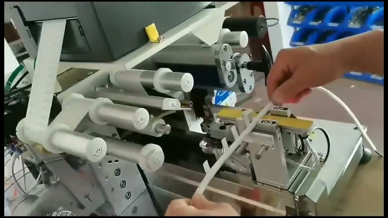 Máquina plegadora de etiquetas para cables de alta precisión con corrección automática